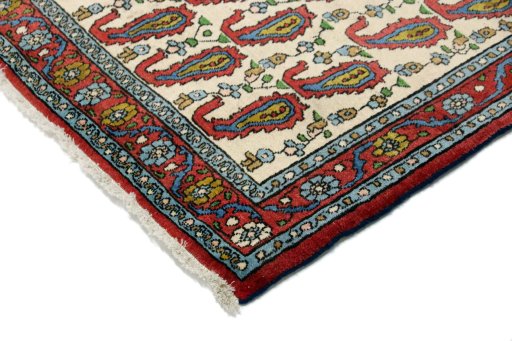 Backside of handmade 1990s Senneh rug showing knot structure and weave density
