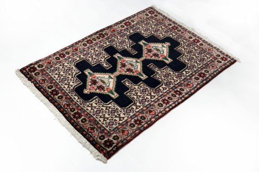 Close-up detail of 1990s Senneh rug from Iran / Persia showing Wool weave