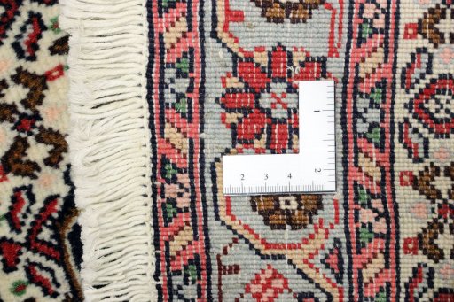Close-up detail of 1990s Senneh rug from Iran / Persia showing Wool weave