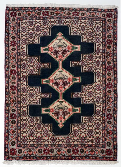 Full view of 1990s Senneh rug from Iran / Persia, 100 × 75 cm in Black tones