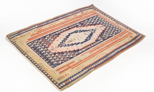 Corner detail of 1920s Senneh rug showing border pattern and Wool pile