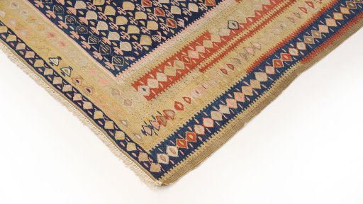 Surface texture of 1920s Senneh rug with natural Wool and intricate pattern