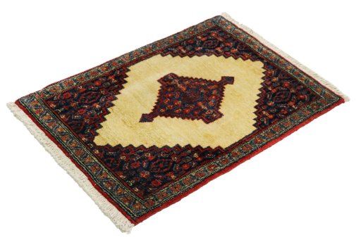 Corner detail of 1990s Senneh rug showing border pattern and Wool pile
