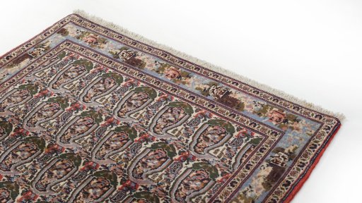 Surface texture of 1950s Senneh rug with natural Wool and intricate pattern