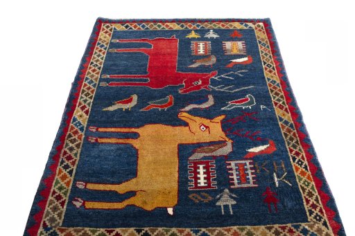 Surface texture of 2000s Shiraz rug with natural Wool and intricate pattern