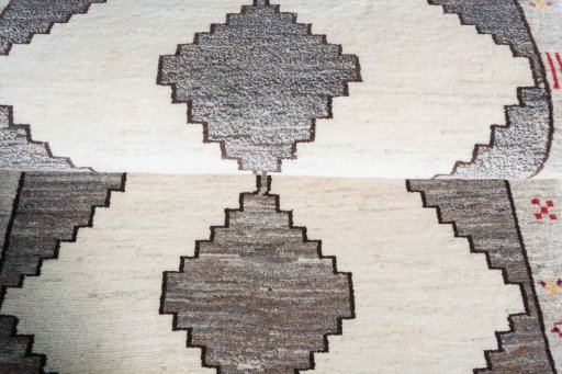 Full view of 2000s Shiraz rug from Iran / Persia, 177 × 90 cm in Beige tones