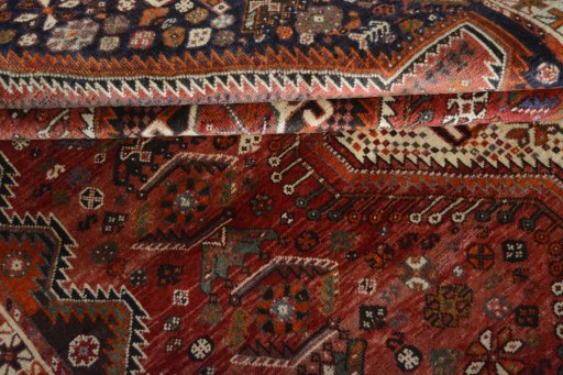 Close-up detail of 2000s Shiraz rug from Iran / Persia showing Wool weave