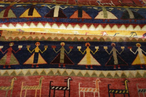 Full view of 2000s Shiraz rug from Iran / Persia, 176 × 105 cm in Multi Color tones