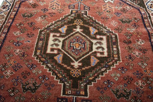 Central medallion detail of 2000s Shiraz rug from Iran / Persia