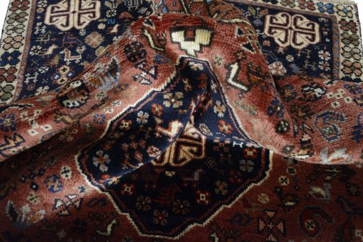 Close-up detail of 2000s Shiraz rug from Iran / Persia showing Wool weave