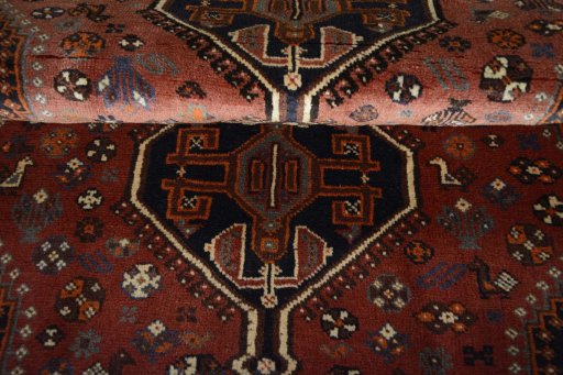 Full view of 2000s Shiraz rug from Iran / Persia, 156 × 120 cm in Red tones