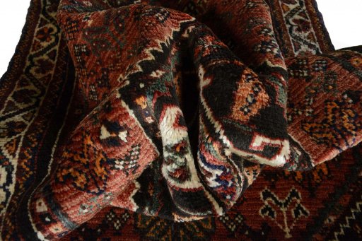 Close-up detail of 2000s Shiraz rug from Iran / Persia showing Wool weave