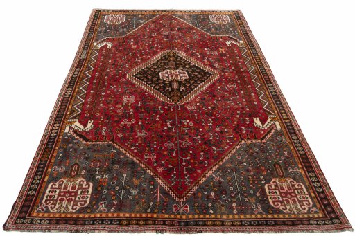Surface texture of 2000s Shiraz rug with natural Wool and intricate pattern
