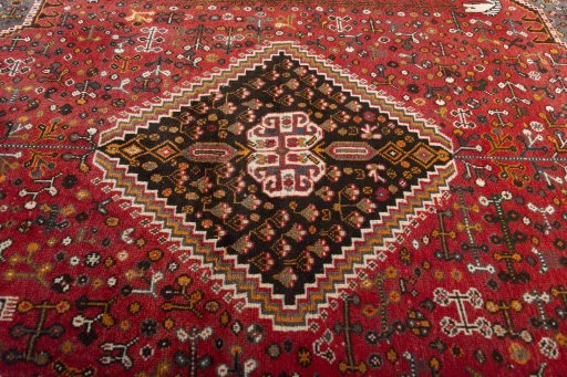 Backside of handmade 2000s Shiraz rug showing knot structure and weave density