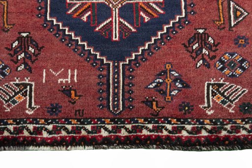 Central medallion detail of 2000s Shiraz rug from Iran / Persia