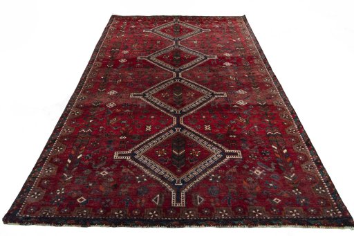 Surface texture of 2000s Shiraz rug with natural Wool and intricate pattern
