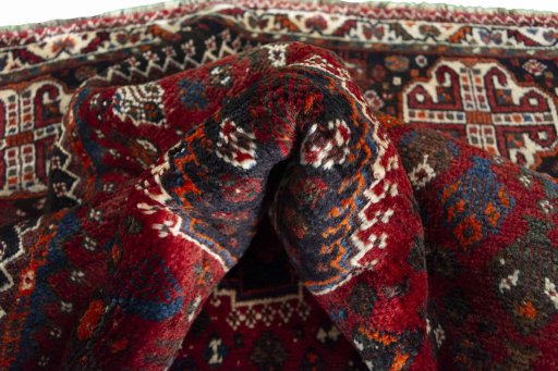 Close-up detail of 2000s Shiraz rug from Iran / Persia showing Wool weave