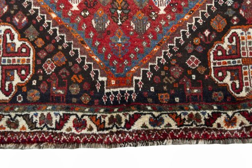 Close-up detail of 2000s Shiraz rug from Iran / Persia showing Wool weave