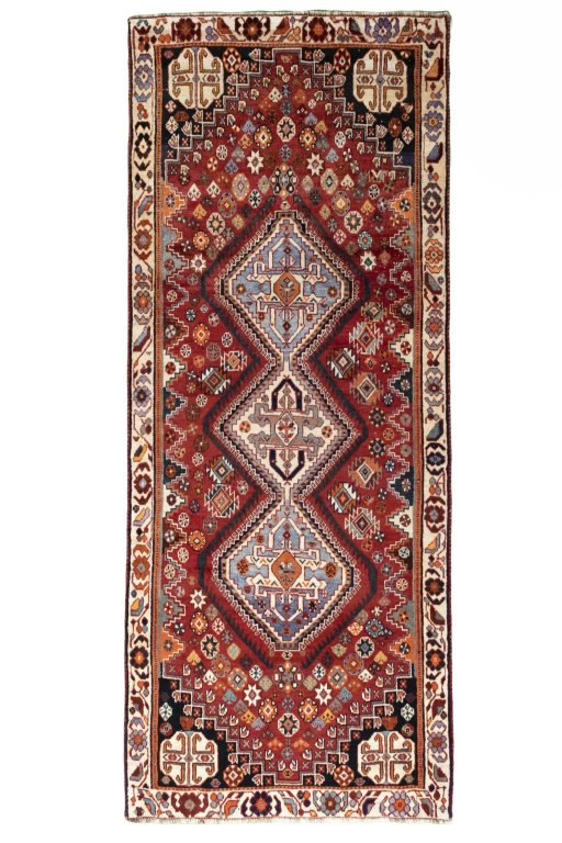 Full view of 2000s Shiraz rug from Iran / Persia, 262 × 106 cm in Red tones