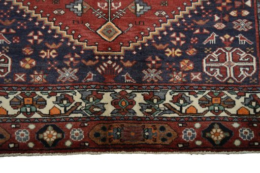 Close-up detail of 2000s Shiraz rug from Iran / Persia showing Wool weave