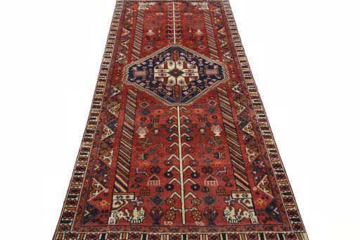 Surface texture of 2000s Shiraz rug with natural Wool and intricate pattern