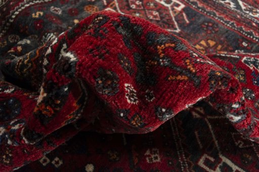 Close-up detail of 2000s Shiraz rug from Iran / Persia showing Wool weave
