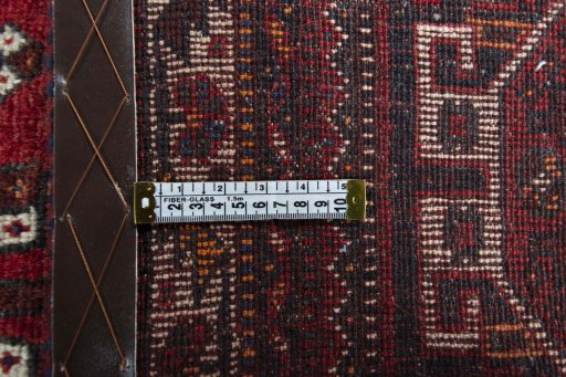 Surface texture of 2000s Shiraz rug with natural Wool and intricate pattern