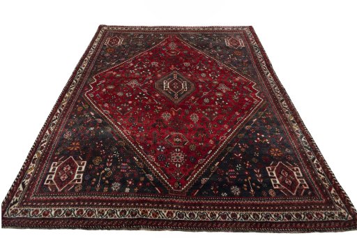 Surface texture of 2000s Shiraz rug with natural Wool and intricate pattern