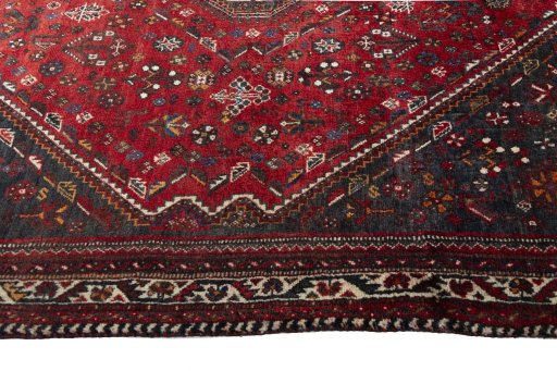 Full view of 2000s Shiraz rug from Iran / Persia, 258 × 185 cm in Red tones