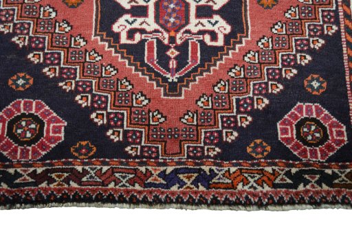 Central medallion detail of 2000s Shiraz rug from Iran / Persia