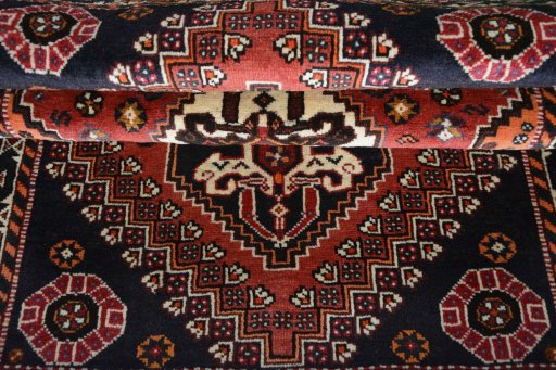 Full view of 2000s Shiraz rug from Iran / Persia, 176 × 114 cm in Red tones