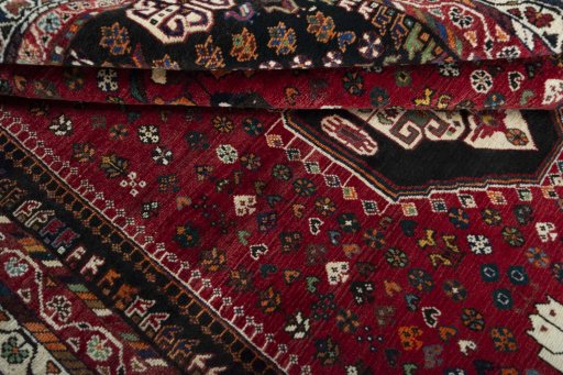 Close-up detail of 2000s Shiraz rug from Iran / Persia showing Wool weave