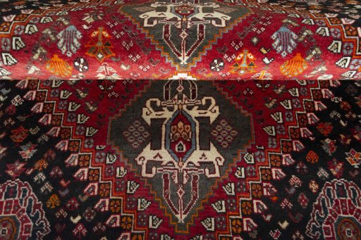 Full view of 2000s Shiraz rug from Iran / Persia, 164 × 120 cm in Red tones