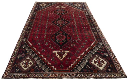 Surface texture of 2000s Shiraz rug with natural Wool and intricate pattern