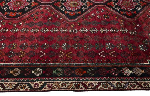 Close-up detail of 2000s Shiraz rug from Iran / Persia showing Wool weave