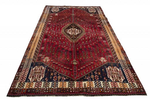 Surface texture of 2000s Shiraz rug with natural Wool and intricate pattern