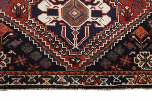 Central medallion detail of 2000s Shiraz rug from Iran / Persia