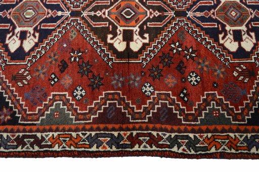 Close-up detail of 2000s Shiraz rug from Iran / Persia showing Wool weave