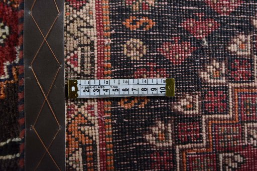Close-up detail of 2000s Shiraz rug from Iran / Persia showing Wool weave