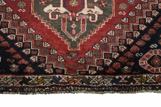 Central medallion detail of 2000s Shiraz rug from Iran / Persia