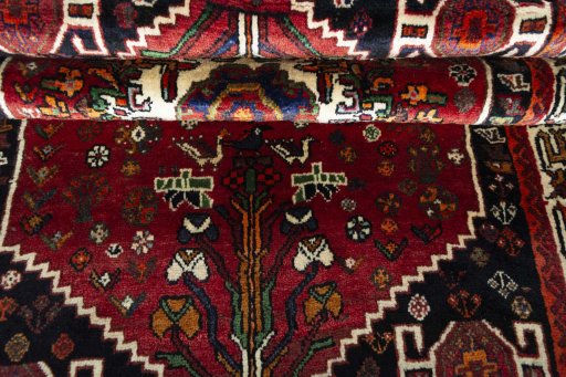 Close-up detail of 2000s Shiraz rug from Iran / Persia showing Wool weave