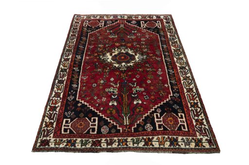 Surface texture of 2000s Shiraz rug with natural Wool and intricate pattern
