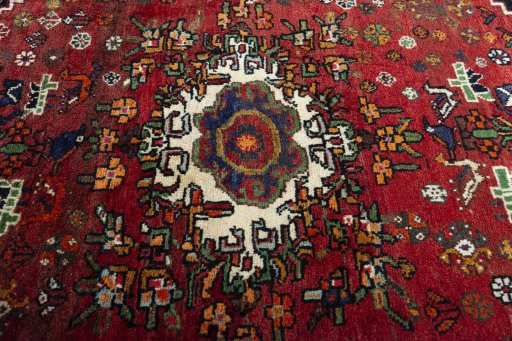 Central medallion detail of 2000s Shiraz rug from Iran / Persia