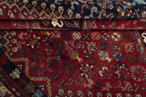 Close-up detail of 2000s Shiraz rug from Iran / Persia showing Wool weave