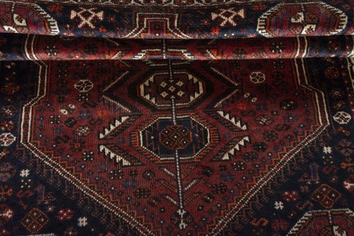 Full view of 2000s Shiraz rug from Iran / Persia, 151 × 108 cm in Red tones