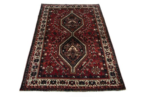 Surface texture of 2000s Shiraz rug with natural Wool and intricate pattern