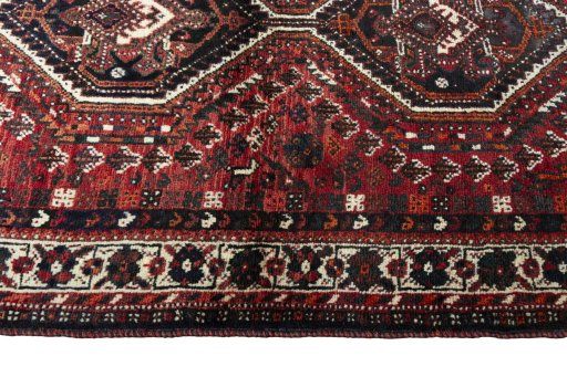 Close-up detail of 2000s Shiraz rug from Iran / Persia showing Wool weave