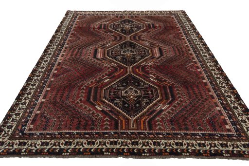 Surface texture of 2000s Shiraz rug with natural Wool and intricate pattern