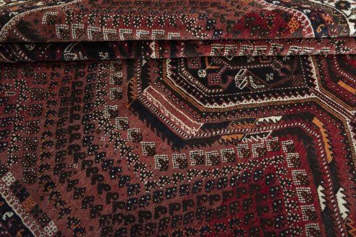 Full view of 2000s Shiraz rug from Iran / Persia, 275 × 207 cm in Red tones