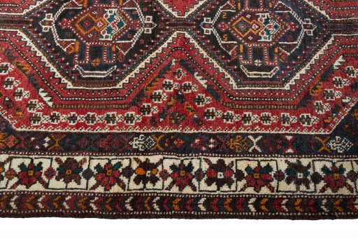 Close-up detail of 2000s Shiraz rug from Iran / Persia showing Wool weave
